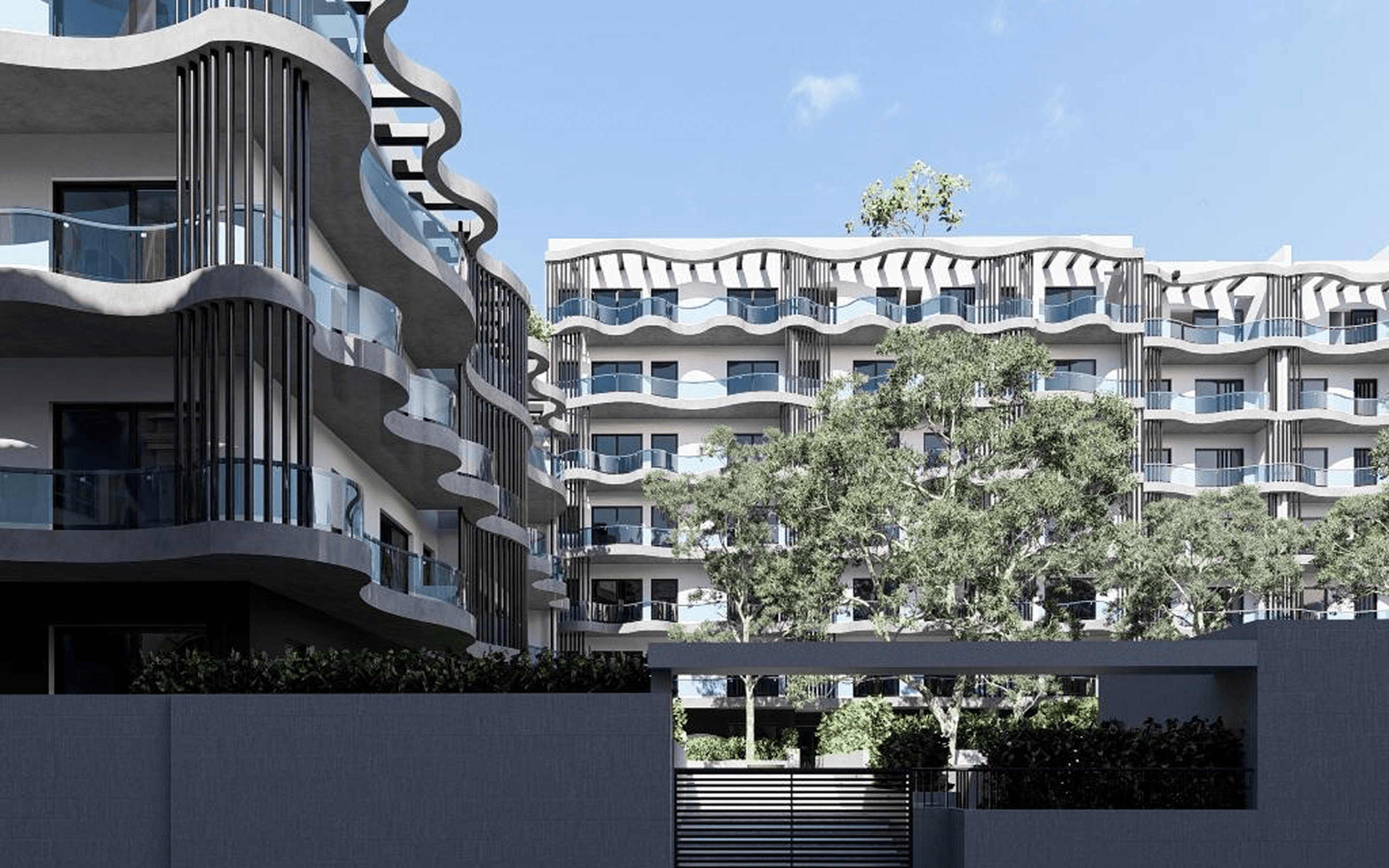 Imagem do pátio do empreendimento residencial e dos espaços ajardinados